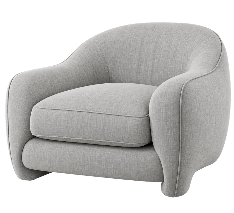 Rounded lounge chair in the palette’s primary color
